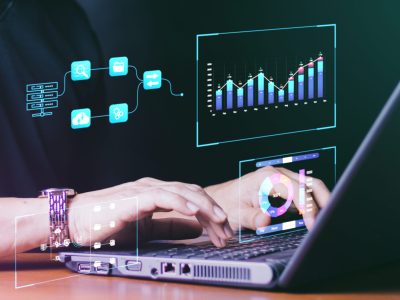 Analyst working with Business Analytics and Data Management System on computer, make a report with KPI and metrics connected to database. Corporate strategy for finance, operations, sales, marketing.